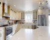 large island , gorgeous quartz countertops