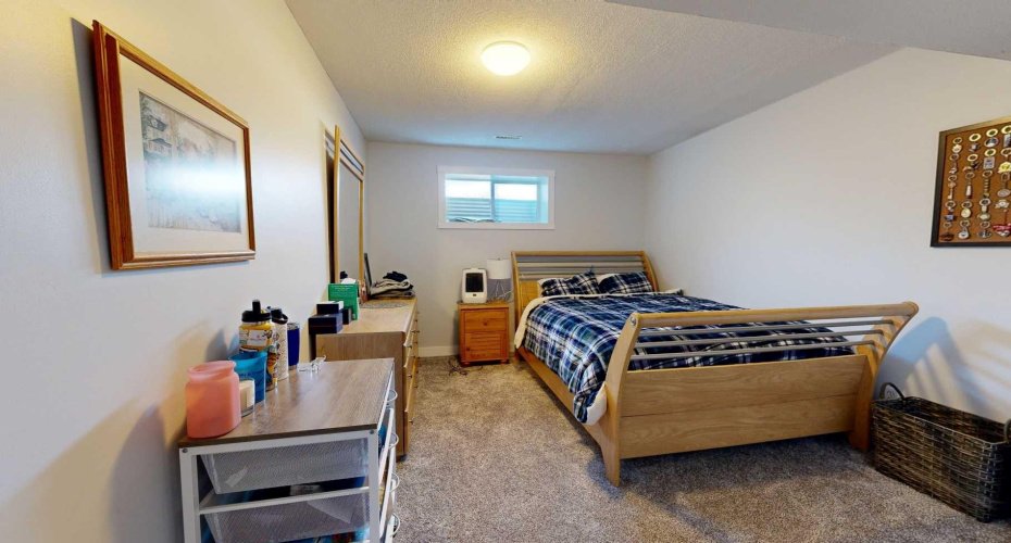 1 of the 2 bedrooms downstairs