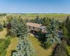 281141 TOWNSHIP ROAD 274, Rural Rocky View County, Alberta T4A 2S3, 5 Bedrooms Bedrooms, ,4 BathroomsBathrooms,Agri-business,For Sale,TOWNSHIP ROAD 274,A2286844