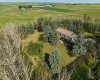 281141 TOWNSHIP ROAD 274, Rural Rocky View County, Alberta T4A 2S3, 5 Bedrooms Bedrooms, ,4 BathroomsBathrooms,Agri-business,For Sale,TOWNSHIP ROAD 274,A2286844