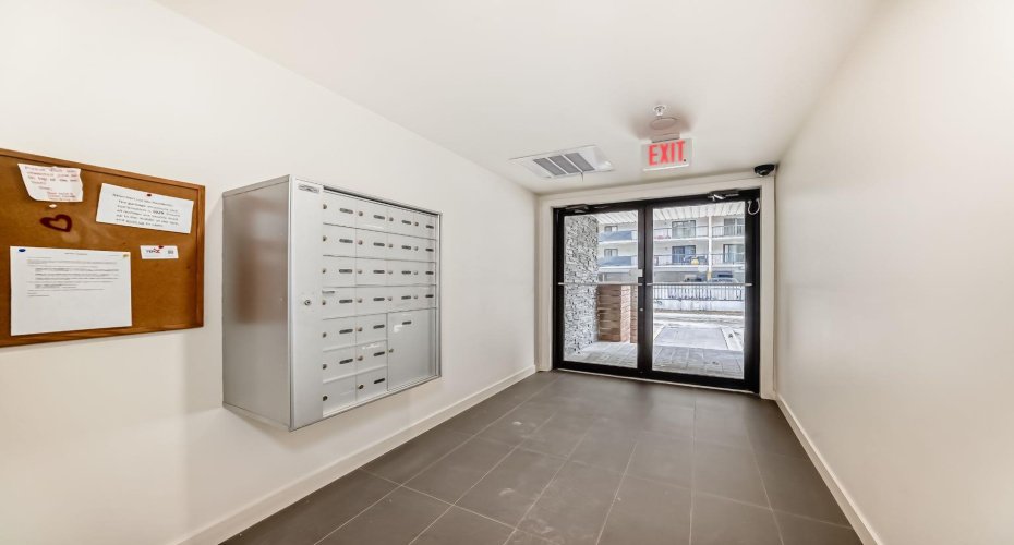Mail area, access to rear parking lot