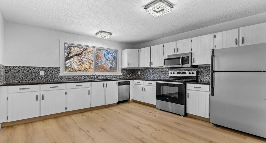 7006A Bowness Road, Calgary, Alberta T3B 0G4, 3 Bedrooms Bedrooms, ,2 BathroomsBathrooms,Residential,For Sale,Bowness,A2292682