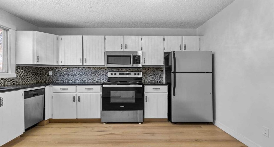 7006A Bowness Road, Calgary, Alberta T3B 0G4, 3 Bedrooms Bedrooms, ,2 BathroomsBathrooms,Residential,For Sale,Bowness,A2292682