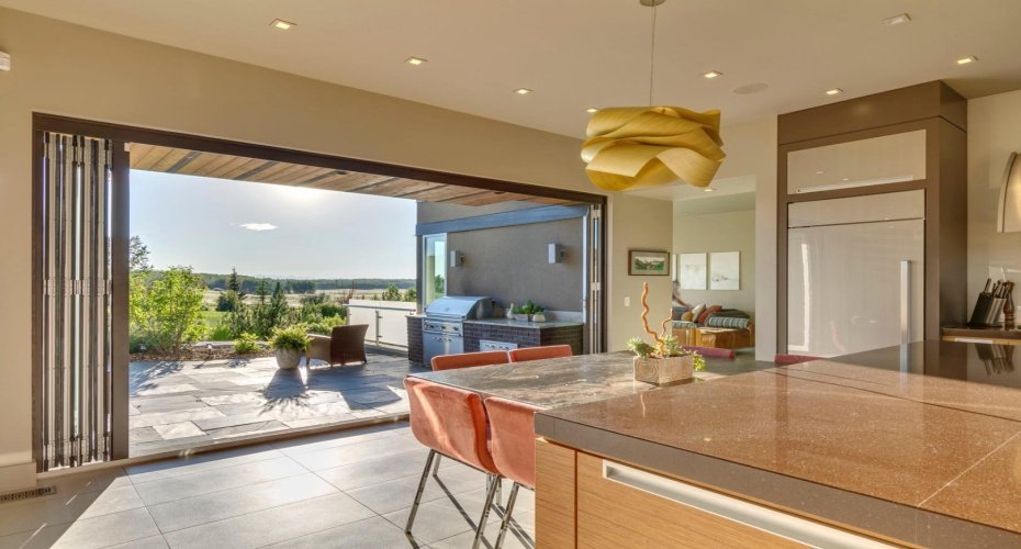 Note the outdoor kitchen area complete with Lynx BBQ.