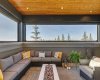 Outdoor lounge is fully screened, fire table is included. Wired for sound and TV it is a stunning extension of the living space.