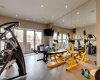 The Fitness Room walks out to the private salt water hot tub area