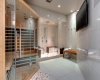 Lower level bath includes steam shower and infrared sauna, a true retreat.