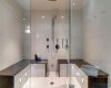 Spacious steam shower/room.