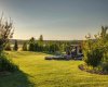 Stunning landscaping includes a beautiful water feature