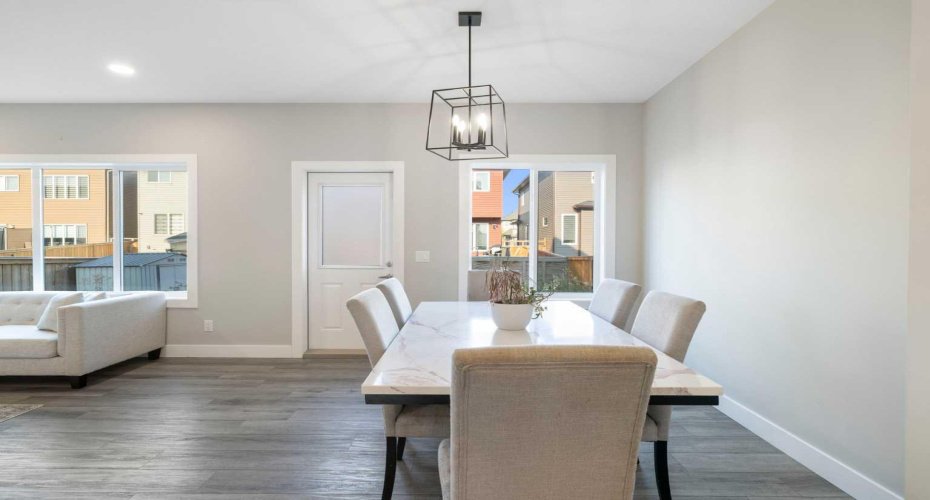 Dining room with living room to the left