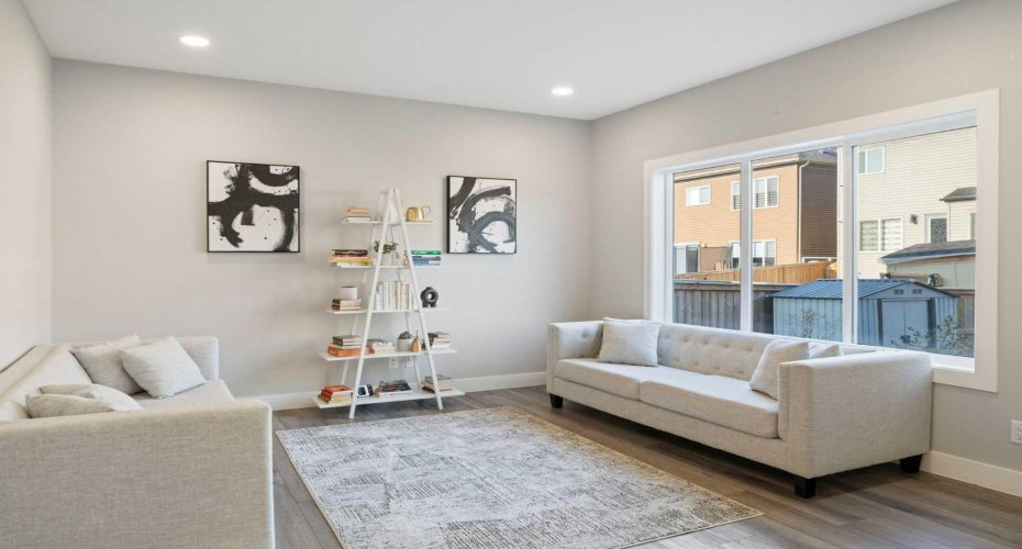 Large living room windows and high ceiling