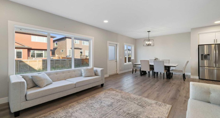 View from living room to dining room and kitchen.