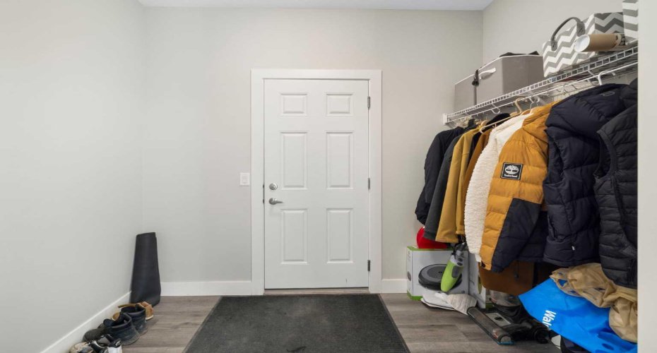 Spacious mud-room at the garage entrance door
