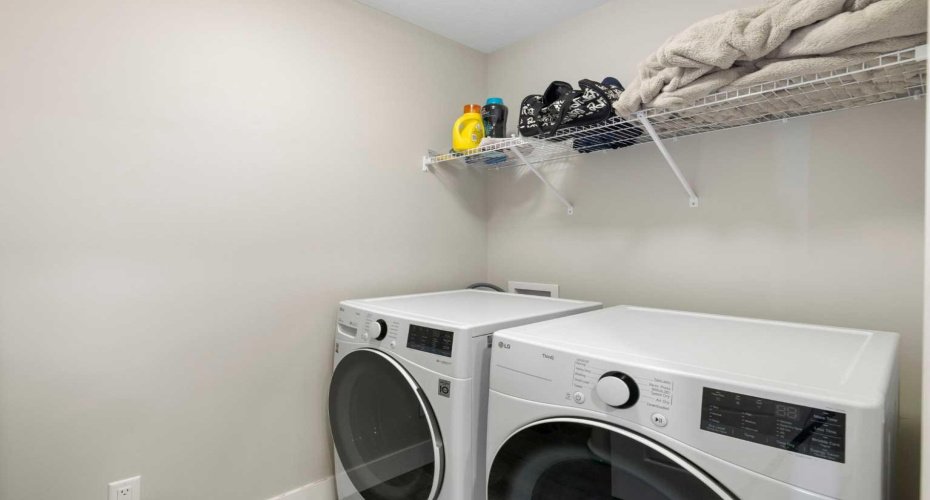 Laundry room is conveniently located near the second floor bedrooms