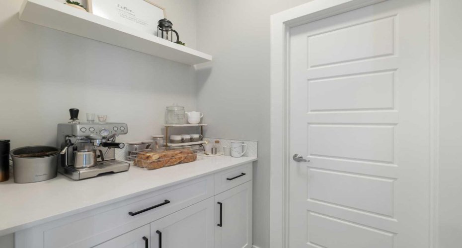 Dedicated coffee station next to the walk-in pantry