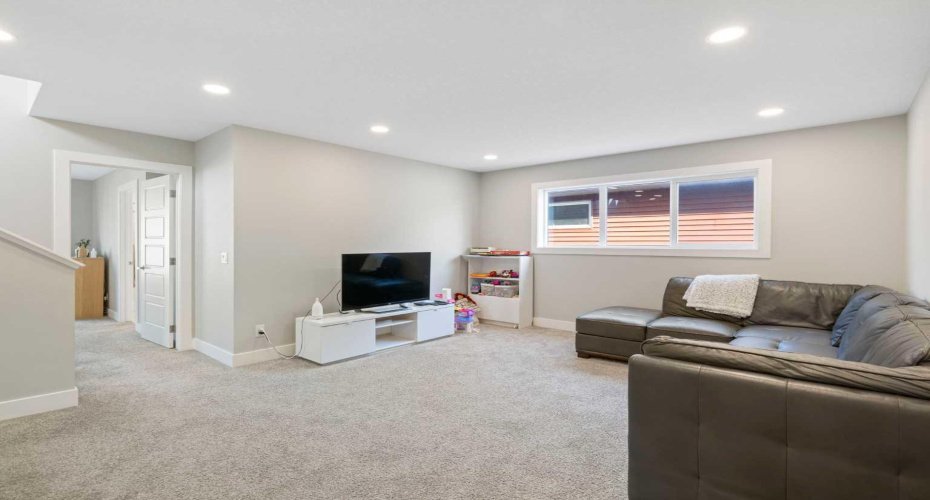 Kick back and relax in this second floor family room