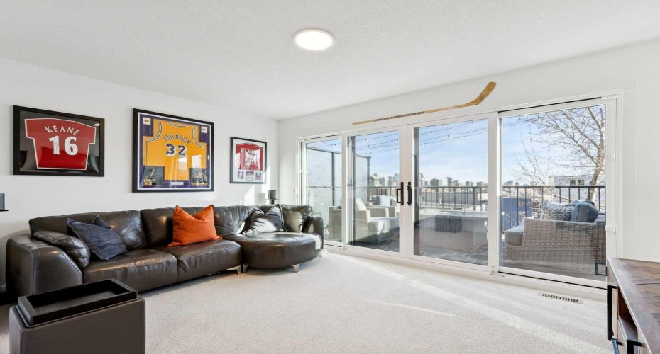 Bonus room with East rooftop patio overlooking downtown