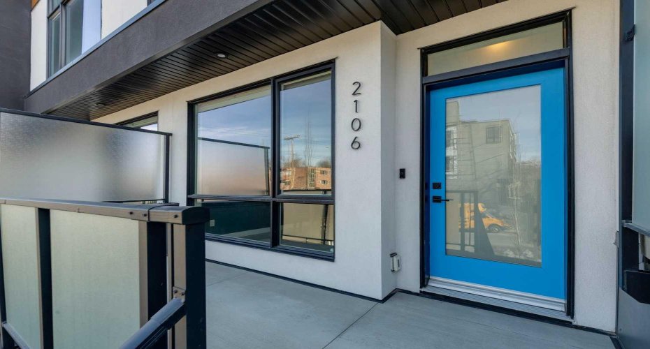 front entry with west facing private patio