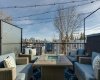 star of the show the rooftop patio with downtown views and mature tree