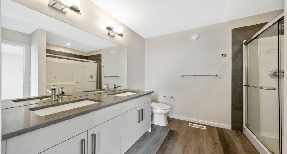 Dual vanities in the primary ensuite bathroom