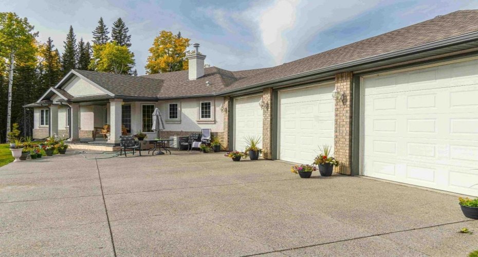 Exposed aggregate apron leading to the front door