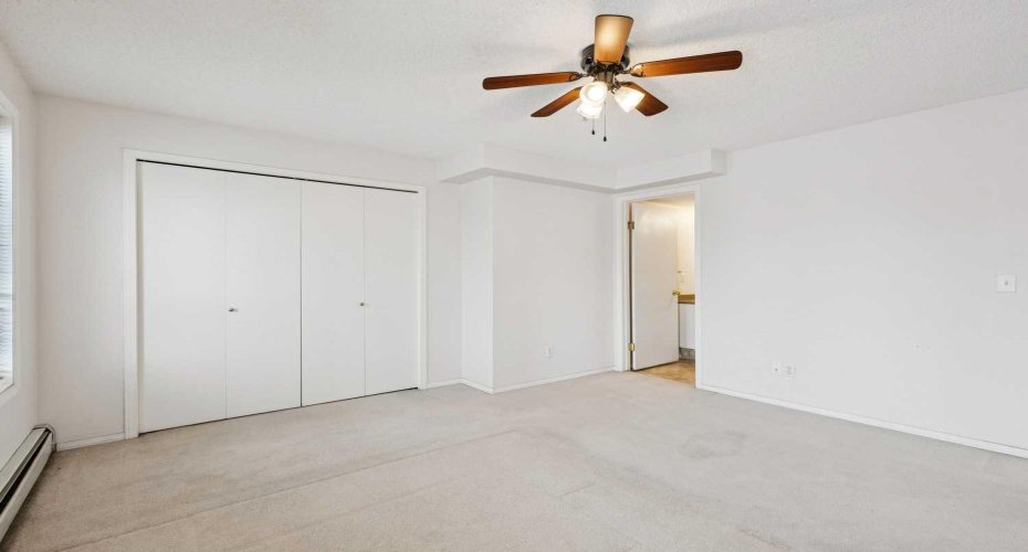 Primary bedroom with large closet and ensuite
