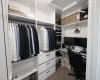 Walkin Closet with.  Exterior window