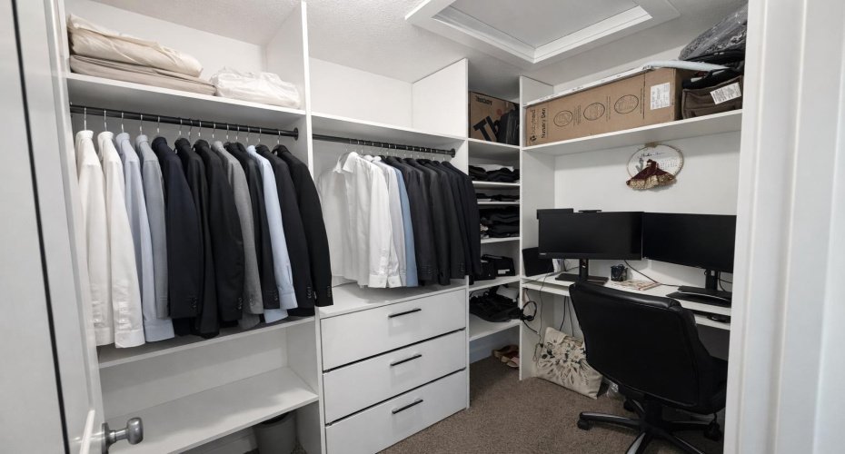Walkin Closet with.  Exterior window