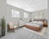 Virtually staged primary bedroom, which easily accommodates a king-size bed and offers a calm, comfortable retreat.