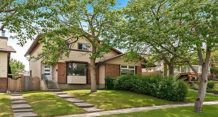 An updated two-storey home, just a short walk to Nose Hill Park and everyday amenities.