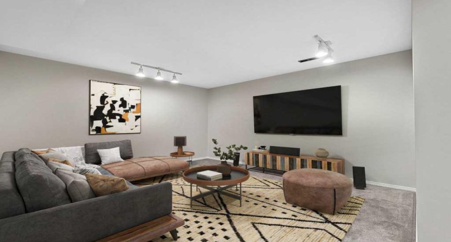 Virtually staged as a family room.