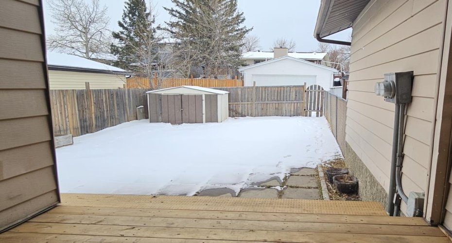 Step out onto the brand-new deck overlooking the large south-facing backyard with plenty of space for future plans like a garage or RV parking.
