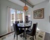 Sunny south facing dining area looking over the backyard and expansive green space