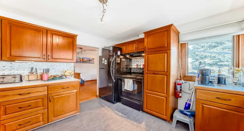 1415 Rosehill Drive, Calgary, Alberta T2K 1M3, 3 Bedrooms Bedrooms, ,2 BathroomsBathrooms,Residential,For Sale,Rosehill,A2295667