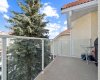 Your balcony overlooks the treed courtyard.