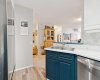 Vinyl flooring, Stainless Steel Fridge & side Pantry Unit.