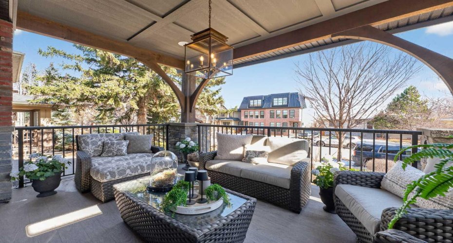 Covered outdoor living space with solid fir beams — seamlessly connected to the main living area.