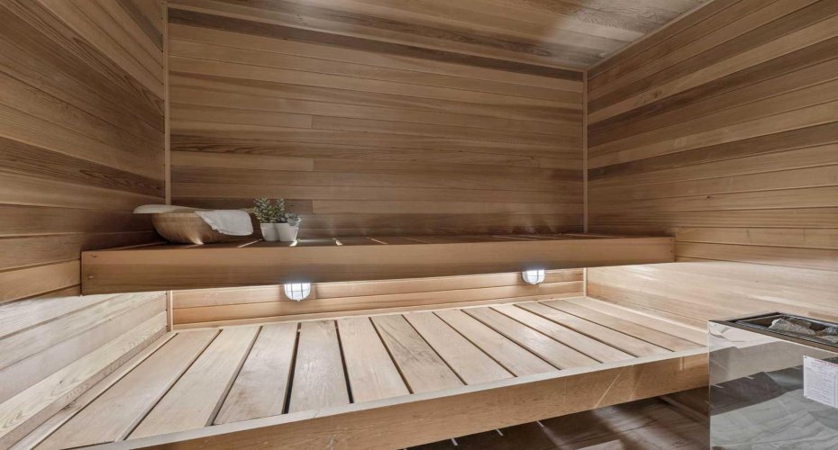 Private Nordic sauna — a luxury amenity increasingly sought after in Calgary's finest homes.