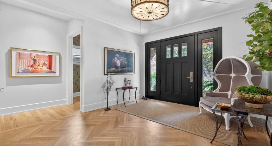 10-foot ceilings, site-finished white oak hardwood, and a floating staircase welcome you inside.