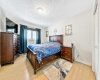 Spacious primary bedroom offering comfort, privacy, and plenty of natural light.
