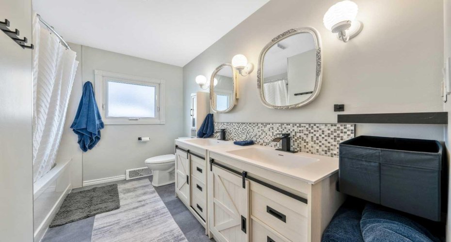 Fully renovated bathroom with clean, modern finishes and a fresh, move-in ready feel.