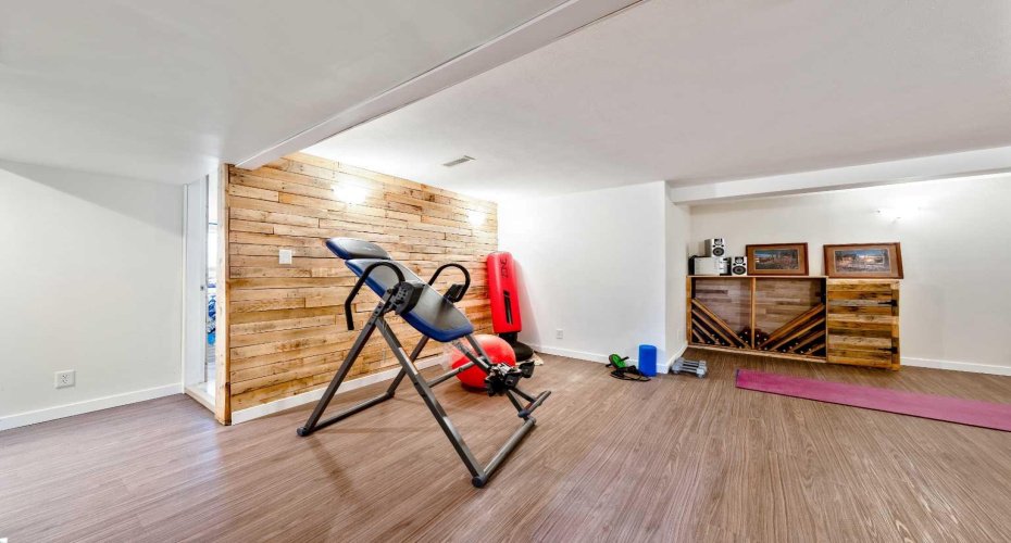 Versatile flex space—ideal for a home office, gym, playroom, or hobby area.