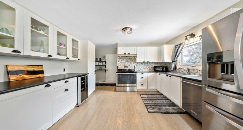 Fully renovated kitchen featuring modern finishes and a clean, beautiful layout.