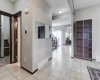 Entrance, open bright, 9 ft ceilings, tile flooring