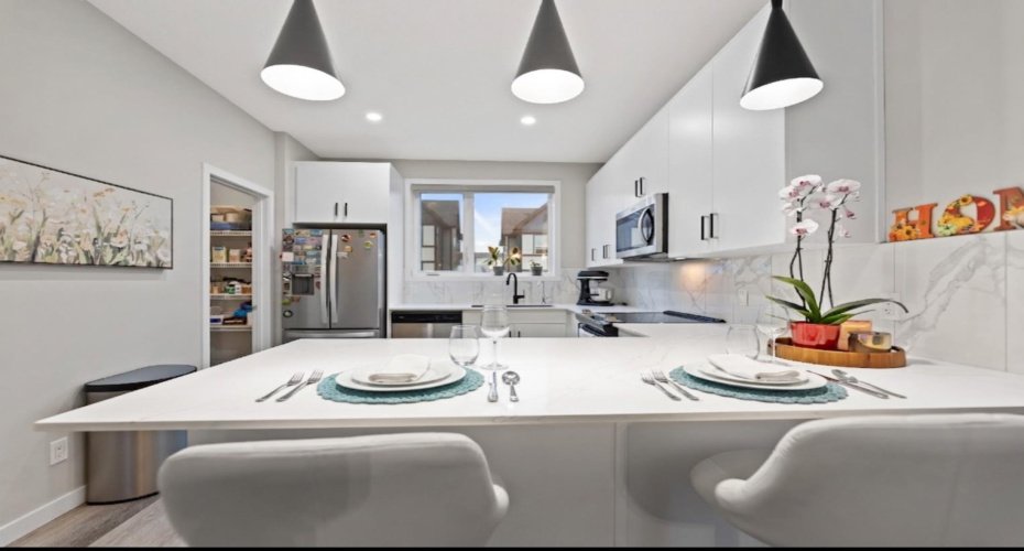 850 Belmont Drive, Calgary, Alberta T2X 4A5, 3 Bedrooms Bedrooms, ,3 BathroomsBathrooms,Residential,For Sale,Belmont,A2296621