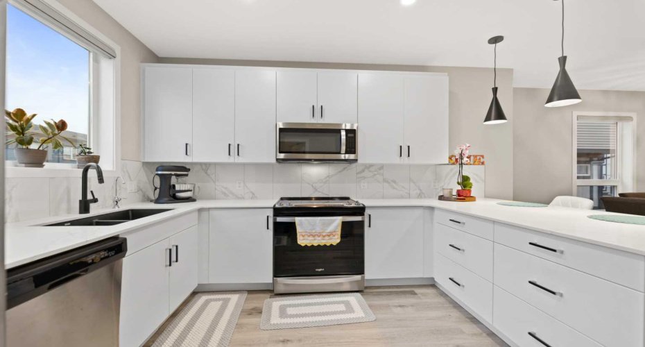 850 Belmont Drive, Calgary, Alberta T2X 4A5, 3 Bedrooms Bedrooms, ,3 BathroomsBathrooms,Residential,For Sale,Belmont,A2296621