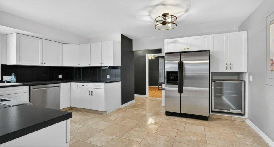 425 Woodland Crescent, Calgary, Alberta T2J 1J7, 4 Bedrooms Bedrooms, ,2 BathroomsBathrooms,Residential,For Sale,Woodland,A2296843