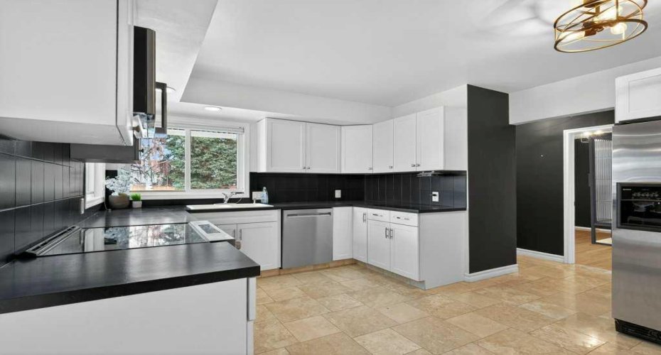 425 Woodland Crescent, Calgary, Alberta T2J 1J7, 4 Bedrooms Bedrooms, ,2 BathroomsBathrooms,Residential,For Sale,Woodland,A2296843