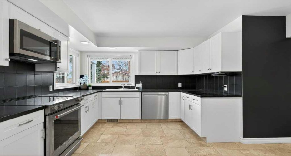 425 Woodland Crescent, Calgary, Alberta T2J 1J7, 4 Bedrooms Bedrooms, ,2 BathroomsBathrooms,Residential,For Sale,Woodland,A2296843