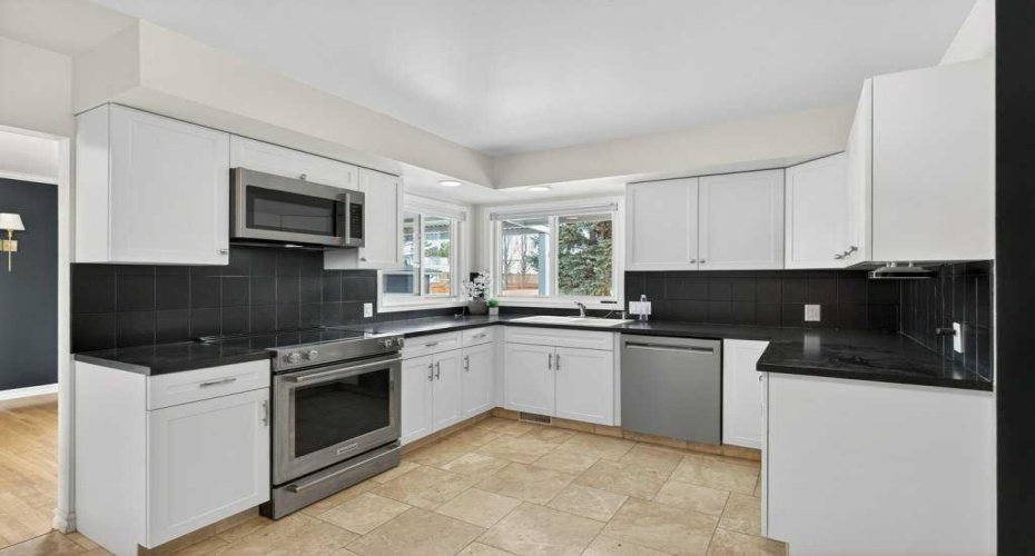 425 Woodland Crescent, Calgary, Alberta T2J 1J7, 4 Bedrooms Bedrooms, ,2 BathroomsBathrooms,Residential,For Sale,Woodland,A2296843